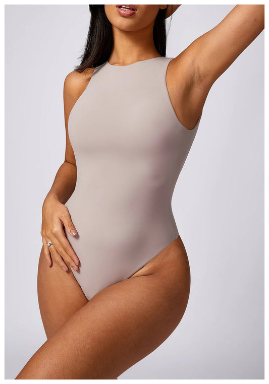 COMPRESSED BACKLESS BODYSUIT - NUDE